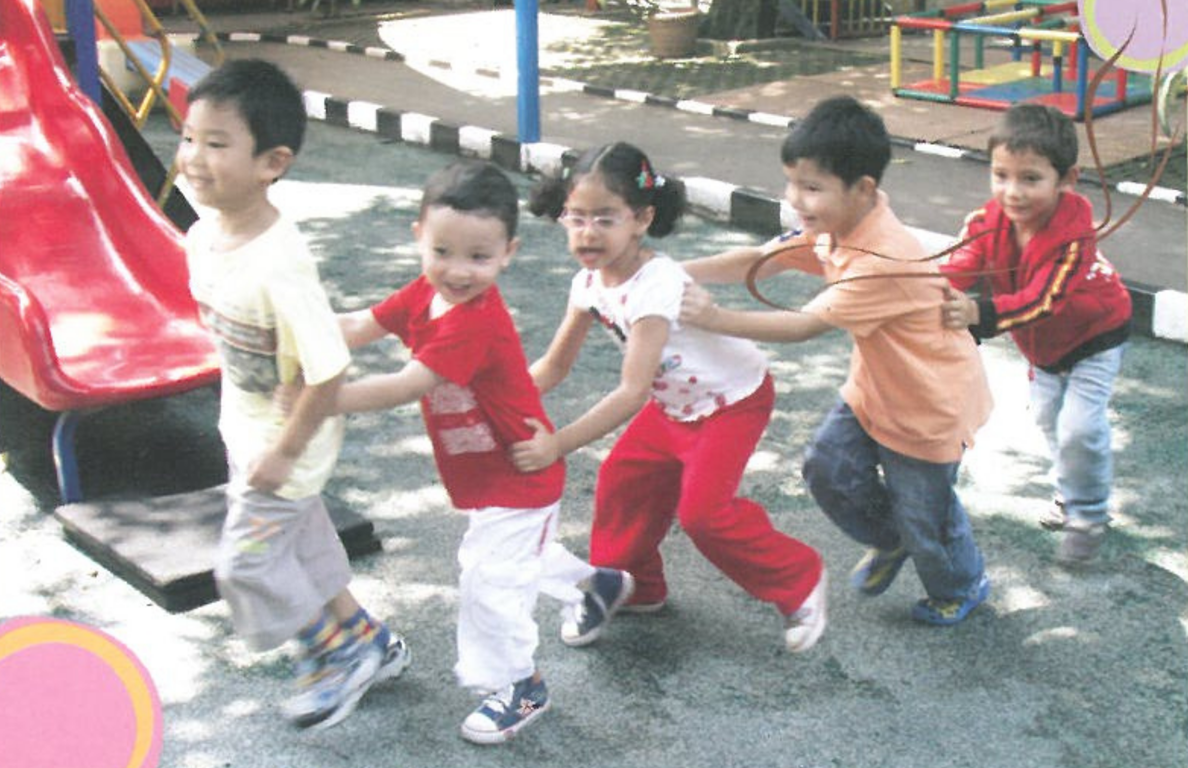 Children laughing together at Tutor Time